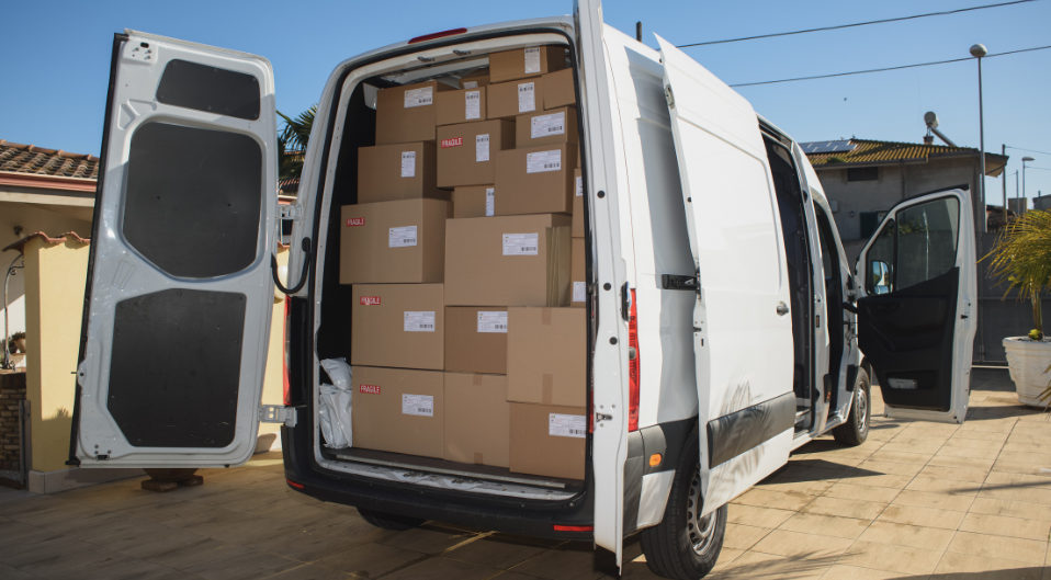 delivery van with doors open full of parcels