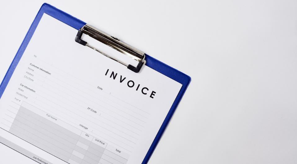 blank invoice on a clipboard