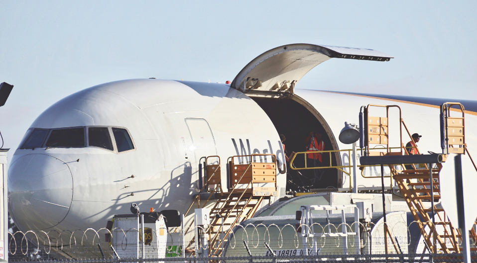 cargo plane being loaded with parcels